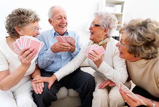 Playing cards at Rolling Meadows Health & Rehabilitation Center