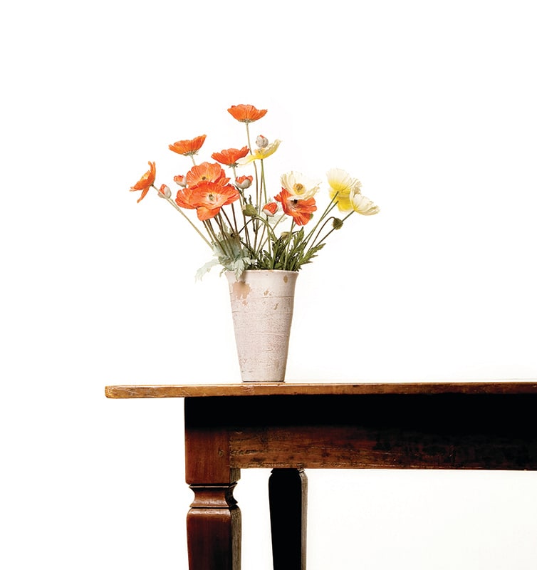 Flowers in Vase on Wooden Table