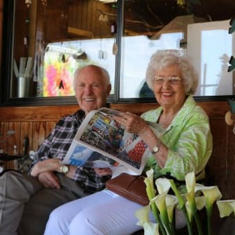 Happy resident enjoying the sunshine at Ray Stone Senior Living