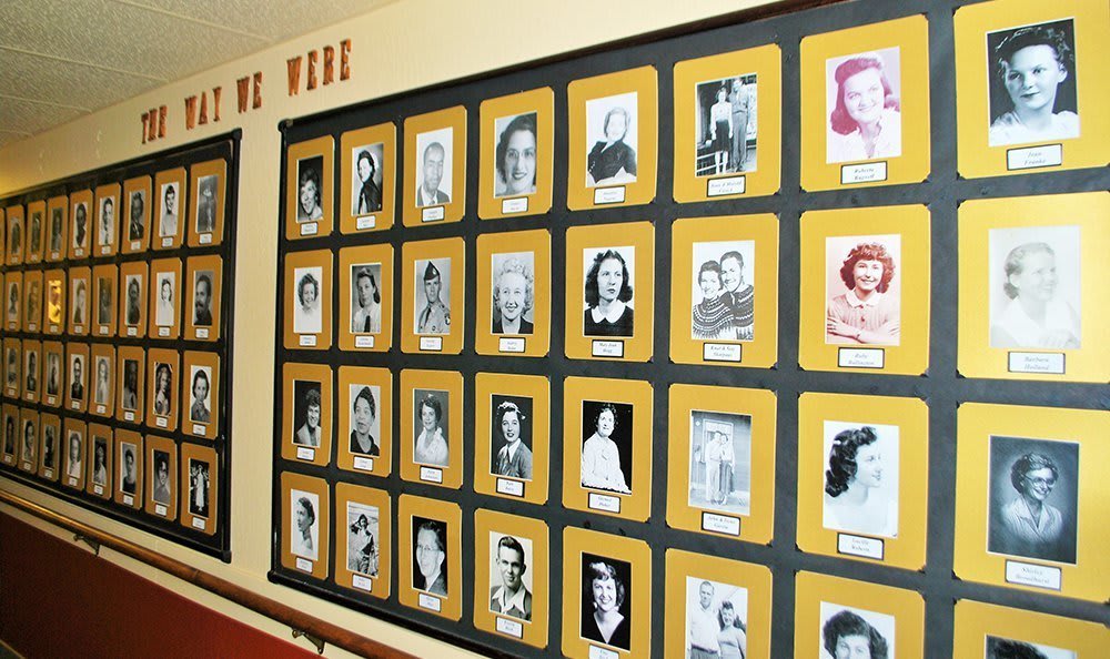 Wall of photos at Campus Commons Senior Living in Sacramento, California