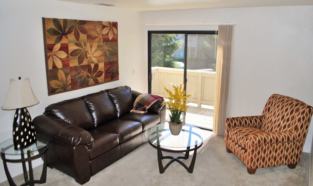 Living room and patio of Zinfandel Ranch Apartments in Rancho Cordova, California