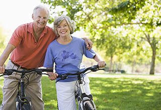 A happy couple on a bike ride
