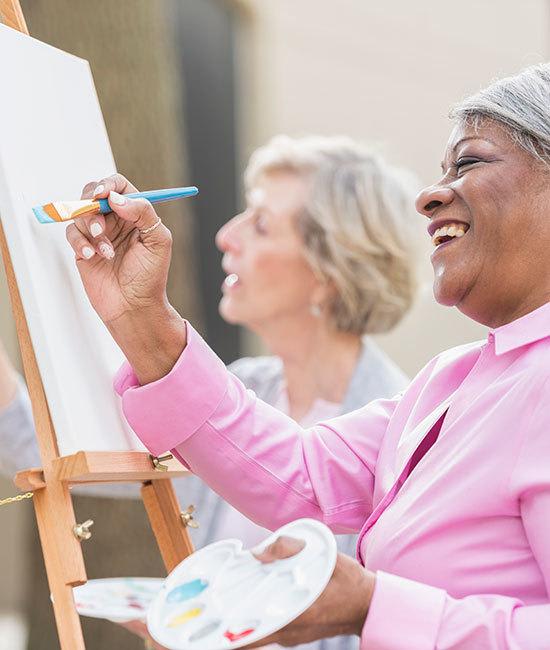 Senior living residents in Cedarbrook of Rochester painting