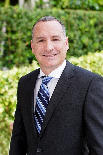 JOSEPH A. ROIG, VICE PRESIDENT OF CONSTRUCTION