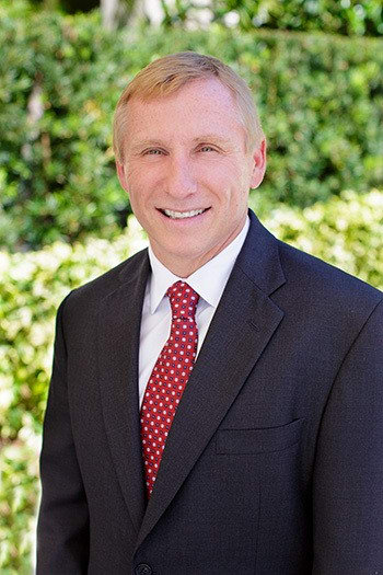 TOM SMITH, SENIOR MANAGING DIRECTOR
