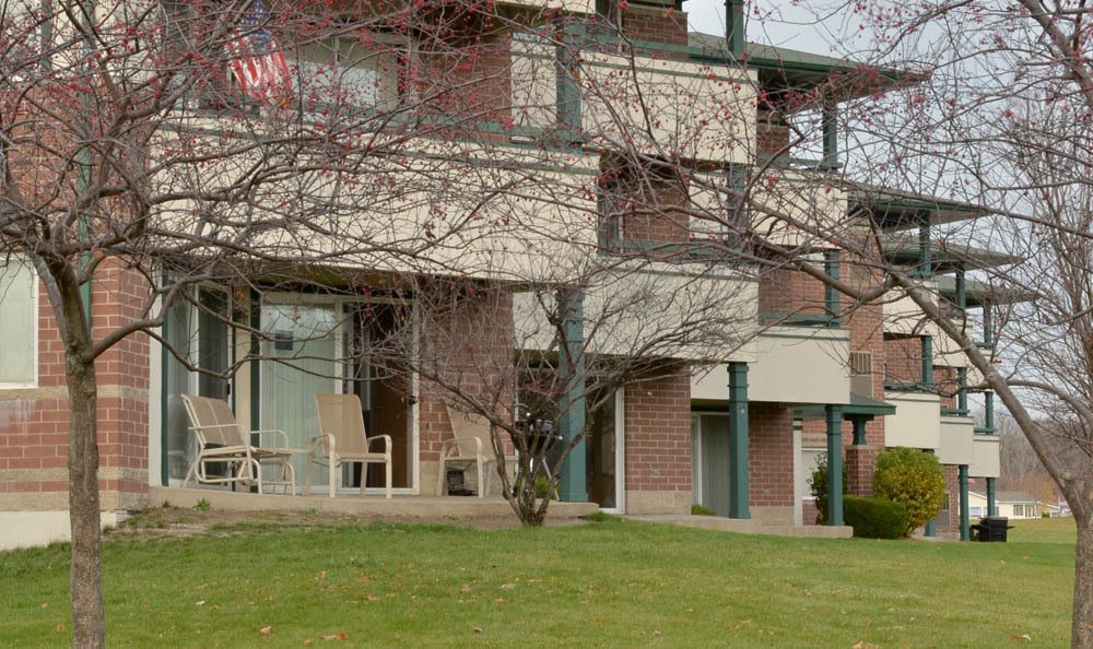 Green Grass Exterior Shot At Hidden Oak Apartments