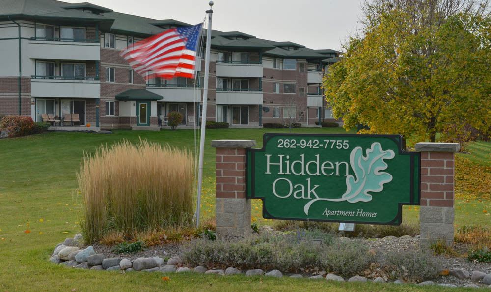 Welcome Sign At Hidden Oak Apartments In Pleasant Prairie