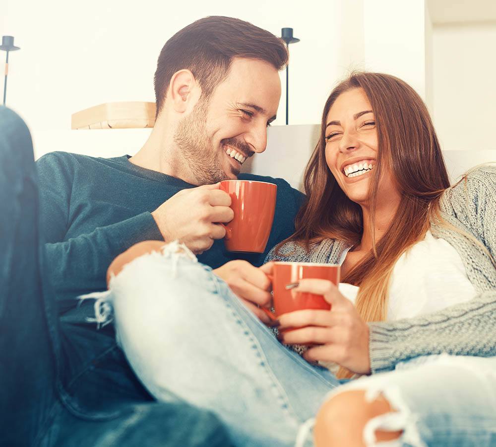 Couple drinking coffee at One Pearl Place