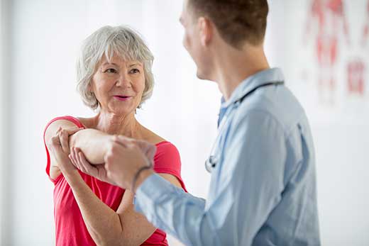 Stretching and rehabilitation at The Care Center of Honolulu in Honolulu