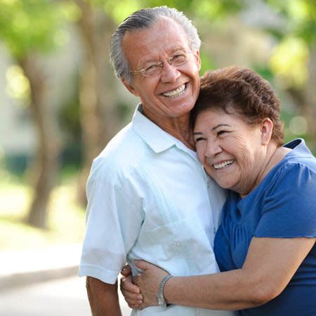 Happy couple hugging at The Terraces at Park Marino in Pasadena