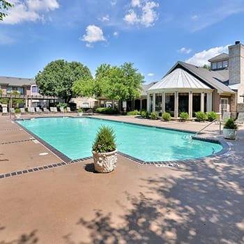 The beautiful swimming pool area is just one of the reasons our residents love Bentley Place at Willow Bend.