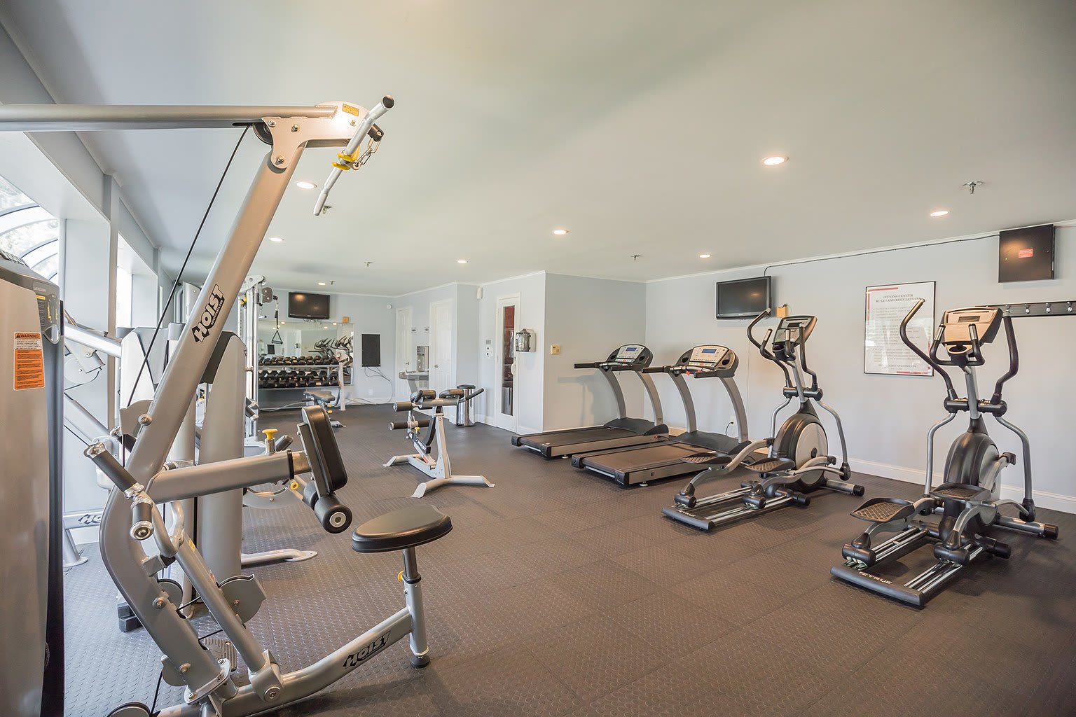 Gym with lots of equipment at The Village at Voorhees in Voorhees, New Jersey