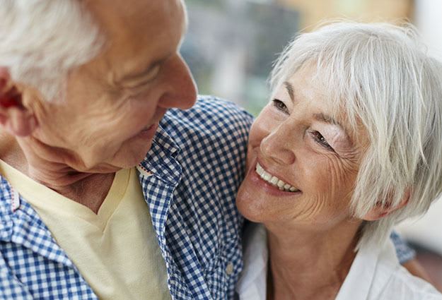 Happy couple enjoying senior living with DELETED - Pacifica Senior Living