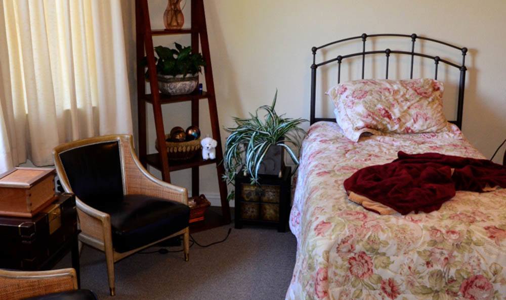 Serene bedroom at Windchime of Chico in Chico, California.
