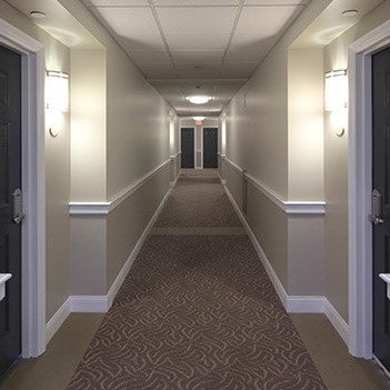 Interior view down one of the beautiful hallways here at Kimball Towers at Burlington.