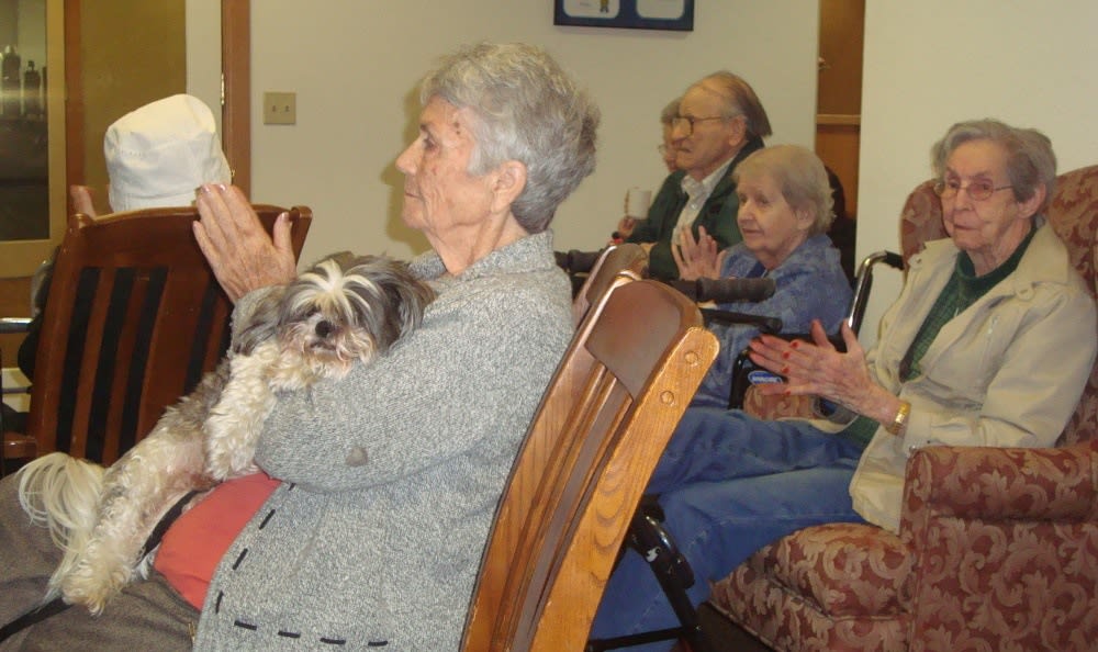 A resident with a pet at Alder Bay Assisted Living in Eureka, California