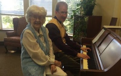 Staff and resident at Alder Bay Assisted Living.