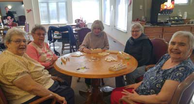 Staff and resident at Avalon Assisted Living Community.