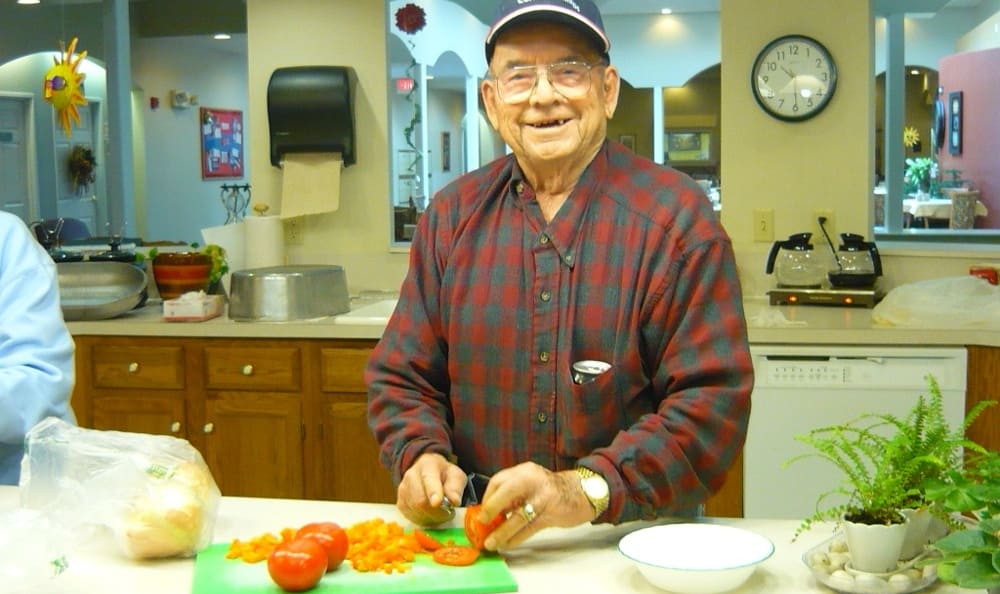 Community cooking at Garden Square Assisted Living of Casper