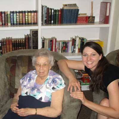 Sitting together at Garden Square of Greeley Assisted Living and Memory Care.