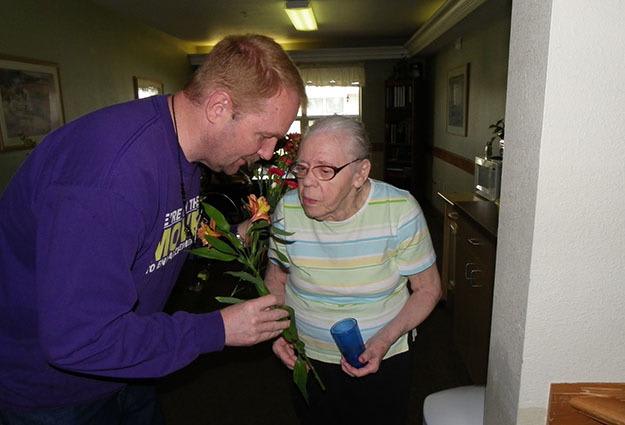 Resident and caregiver at Prairie House Assisted Living and Memory Care