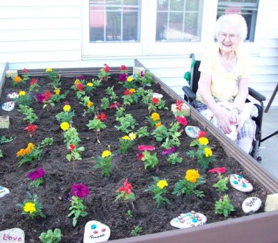 Women enjoying the plants at Marla Vista Assisted Living and Memory Care