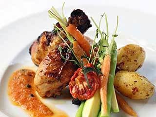 An amazingly delicious chicken dinner from Sensations Dining at Lakeside at Mallard Landing in Salisbury.