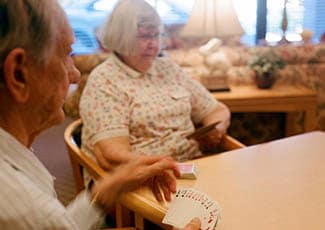 Card game at senior living in Henderson