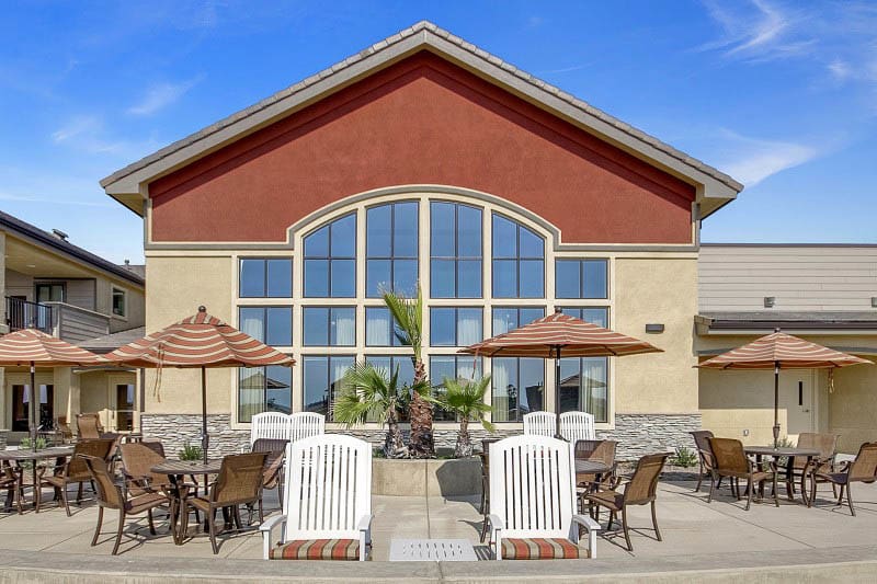 Patio seating at The Pines, A Merrill Gardens Community in Rocklin, California. 