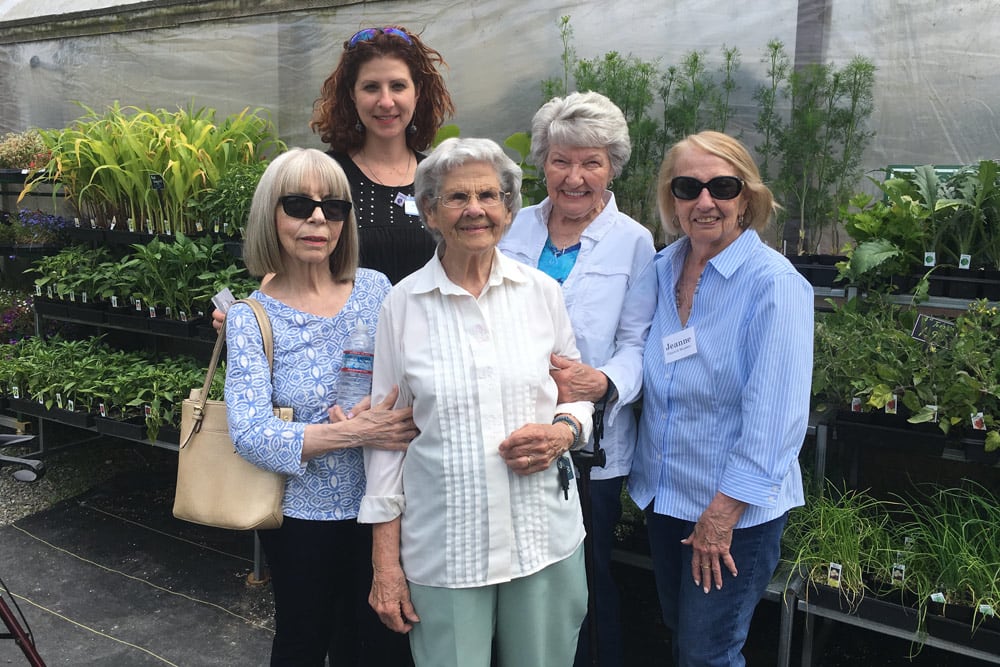 Greenhouse gardening trip at Merrill Gardens at Burien in Burien, Washington. 