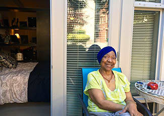 Happy resident at senior living in Oakland