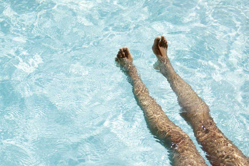 Relax by the pool at Rosemont Square Apartments in Randolph, Massachusetts