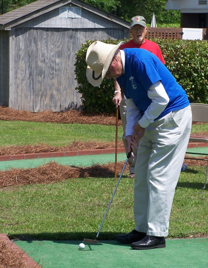 Playing golf at The Florence Presbyterian Community