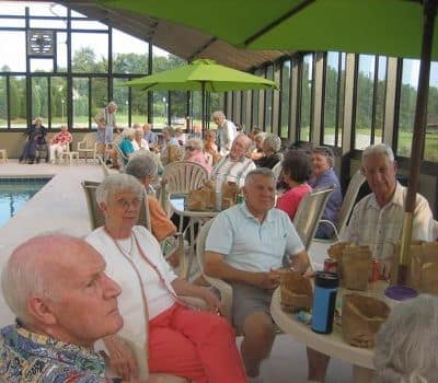 Social activity near the pool at The Foothills Presbyterian Community in Easley