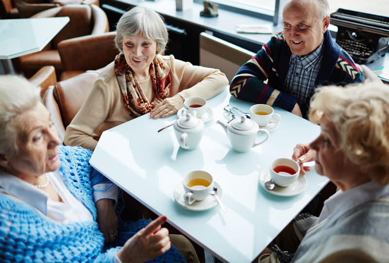 Friends enjoying coffee at The Village at Summerville