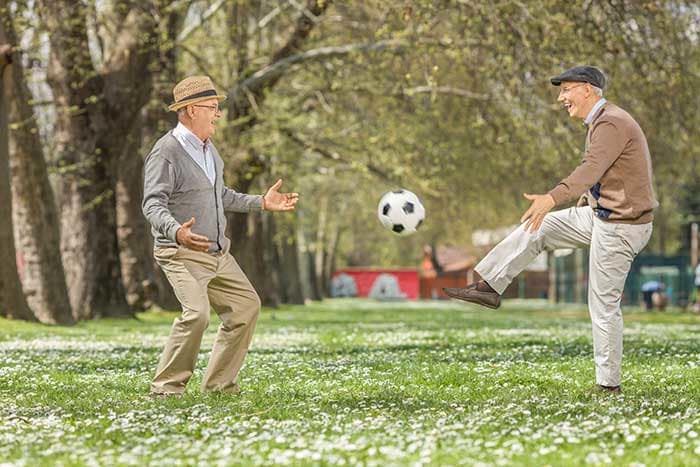 Senior living doesn't have to be boring. Kick a ball and laugh at The Florence Presbyterian Community.