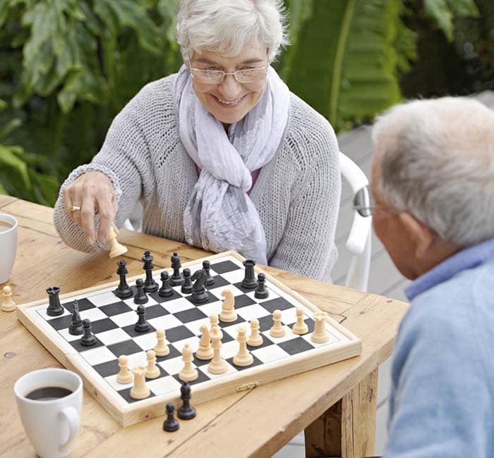 Seniors enjoying a friendly game of chess