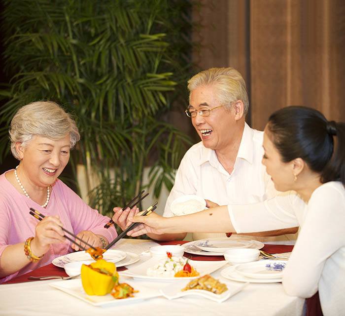 Sharing a meal at our senior community in China