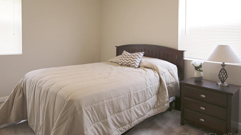 Renaissance Park Apartments offers a natrually well-lit bedroom in College Station, TX