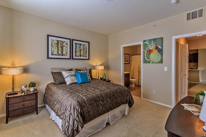 Masterbedroom at The Crossings at Bear Creek Apartments in Lakewood,