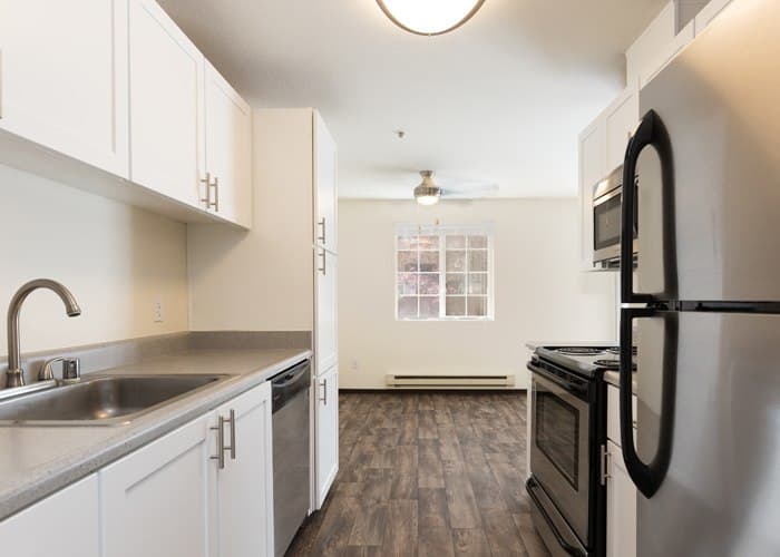 Kitchen and Living Room at Renaissance at 29th Apartments in Vancouver