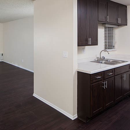 Kitchen and Living Room at Kendallwood Apartments in Whittier,CA
