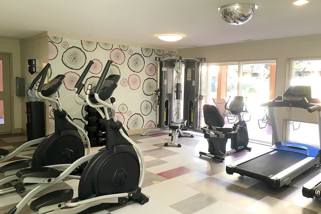 Fitness center at The Timbers Apartments in Hayward