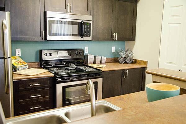 Kitchen and Living Room at Wildreed Apartments in Everett