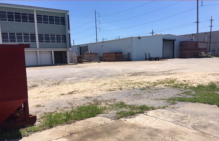 Pre-renovation photo of the exterior of buildings at the Franklin Avenue property.