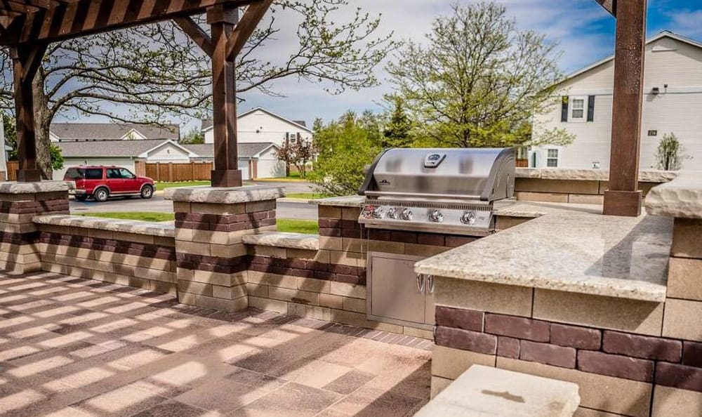 Outdoor grill and patio at Lakeview Townhomes at Fox Valley