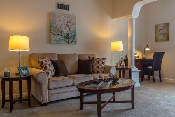 Well-lit living room of Stonebrook Village at Windsor Locks