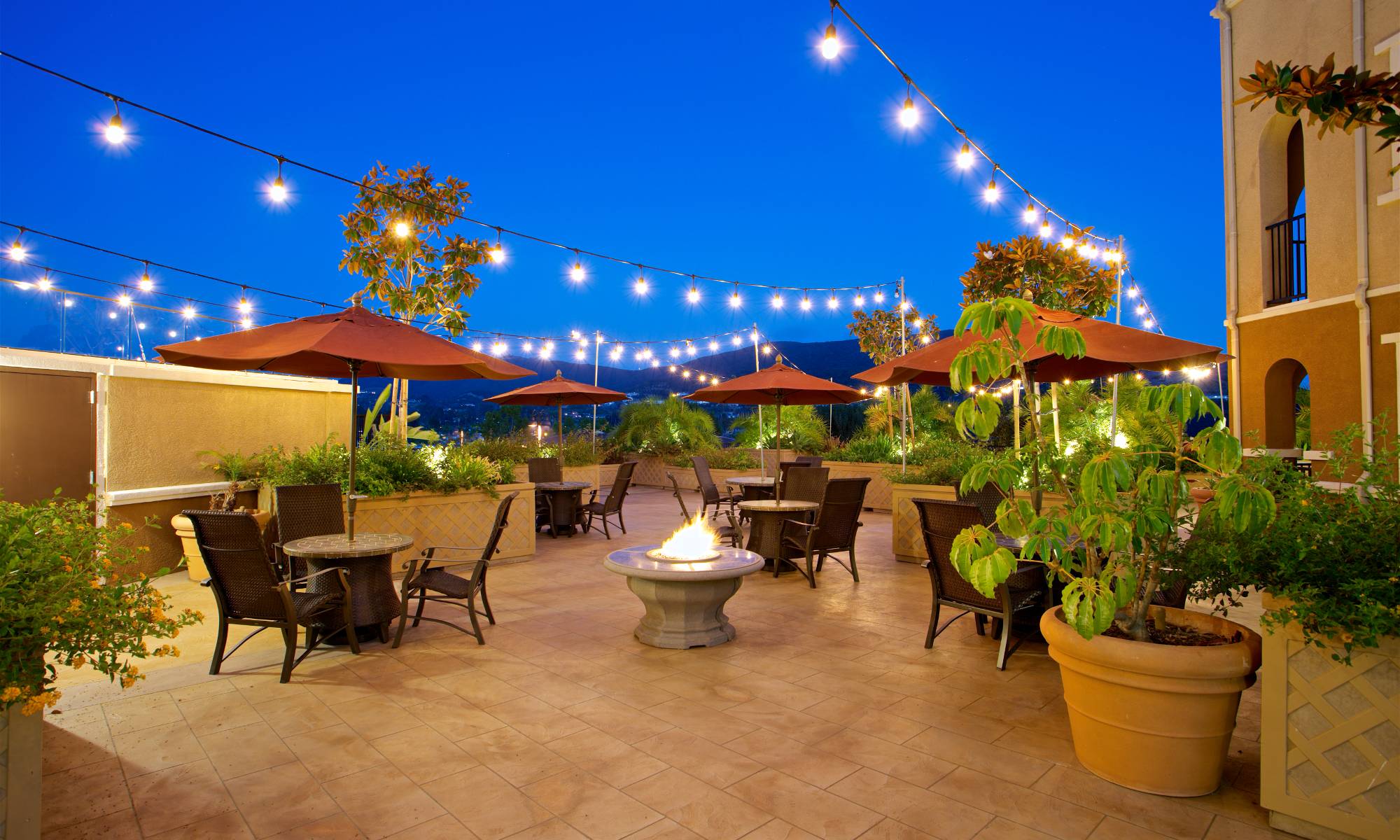 Beautiful porch with twinkling lights at The Meridian at Lake San Marcos