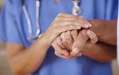 Professional staff taking care of residents at Pacifica Senior Living South Coast