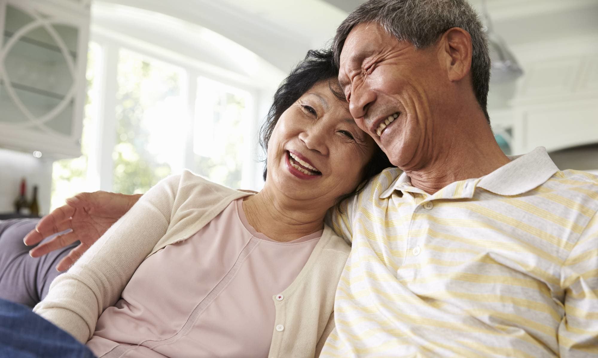 Happy couple living at Pacifica Senior Living Union City